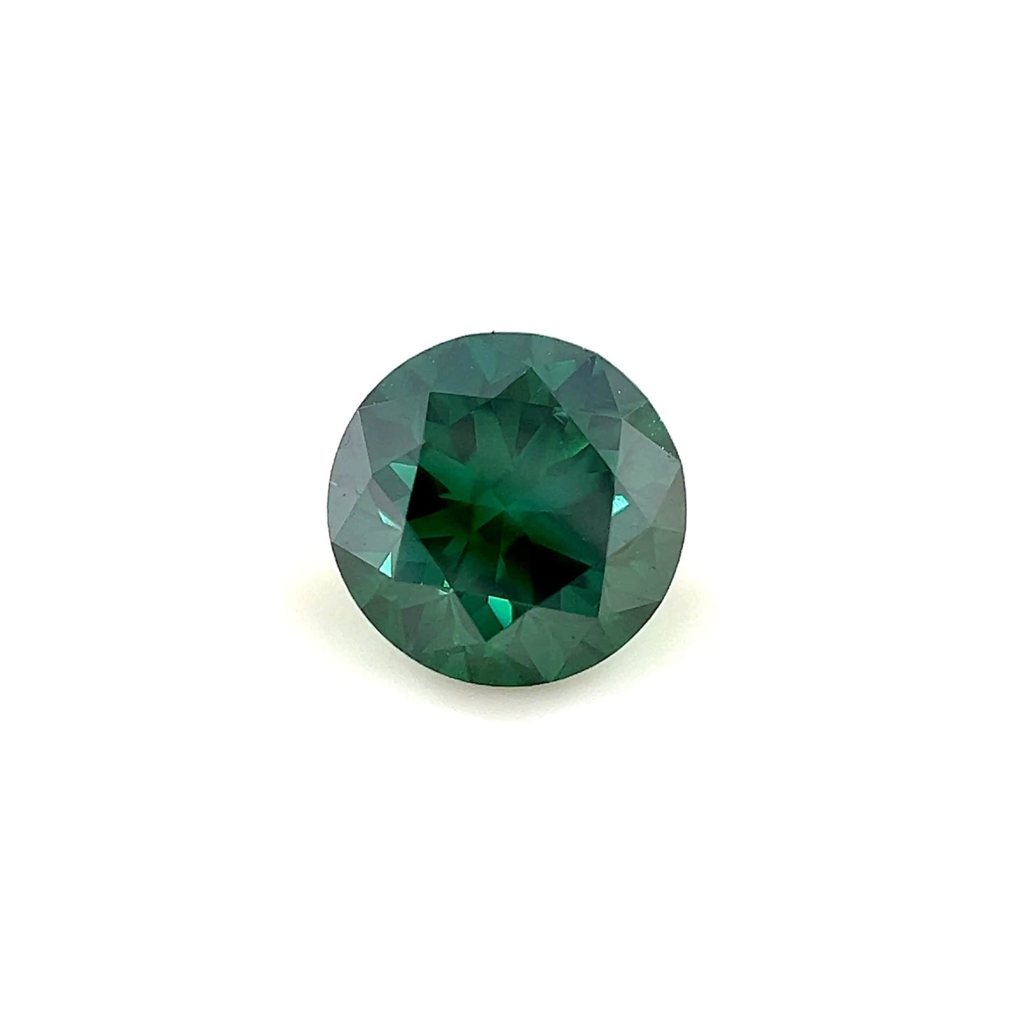 A 1.45 carat round 7mm Premium Forest Green Diamond is displayed on a plain white background, highlighting its faceted brilliant cut and reflective surfaces.