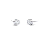 A pair of Lab Diamond Earrings - Bezel Set - Ishanvi, featuring round clear lab diamonds in sleek silver bezels, displayed on a plain white background.