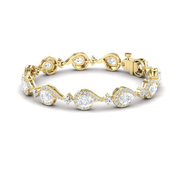 The Lab Grown Diamond Tennis Bracelet - Gemma features alternating oval and teardrop-shaped settings with sparkling diamonds, connected by round diamond links and finished with a secure gold clasp.