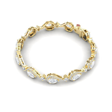 The Lab Grown Diamond Tennis Bracelet - Gemma features oval and round diamond clusters in an alternating pattern, displayed on a white background.