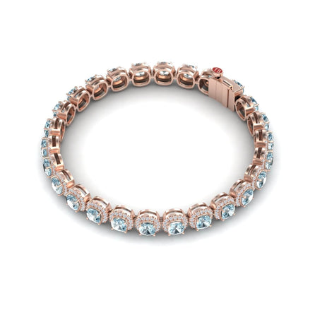 The Aquamarine & Diamond Halo Tennis Bracelet - Isabella features sparkling gemstones in prong settings, showcased on a white background.