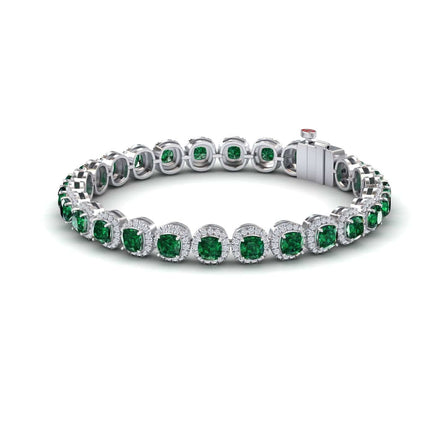 The Lab Grown Emerald & Diamond Halo Tennis Bracelet - Isabella features alternating round green lab-grown emeralds and clear diamonds, arranged in a circle with a visible clasp on one side.