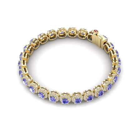 The Tanzanite & Diamond Halo Tennis Bracelet - Isabella showcases a row of round blue gemstones in prong settings with a secure clasp, elegantly displayed on a white background.