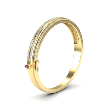 The Bold White Diamond Bangle: Unconventional Elegance - Amalia features two parallel rows of sparkling white stones, a secure clasp, and a distinctive small red circular detail near the hinge.
