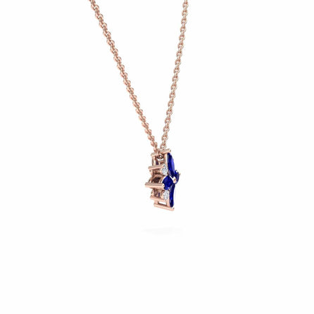 The Blue Sapphire & Diamond Flower Necklace - Keira is a rose gold chain necklace with a blue sapphire and diamond flower pendant shown against a plain white background.