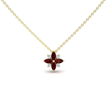 The Ruby & Diamond Flower Necklace - Keira features a gold chain with a flower pendant, adorned with four marquise-cut red gemstones as petals and four round white gemstones in a symmetrical design.