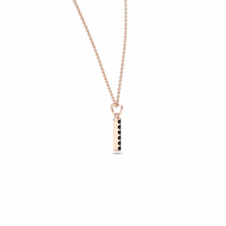 The Black Diamond Vertical Bar Necklace - Lalita is a delicate rose gold necklace with a vertical rectangular pendant featuring a row of small black diamonds on one side, shown against a plain white background.