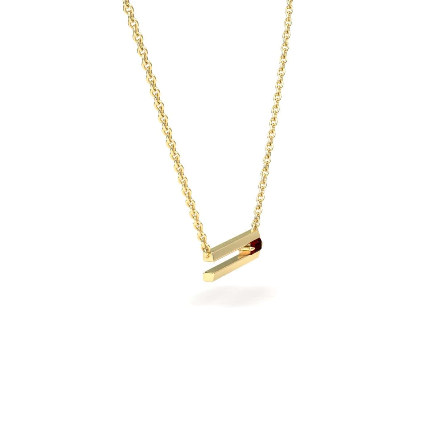 The Garnet Bar Necklace - Cecilia features a modern gold chain with a rectangular pendant accented by a small red garnet, shown on a white background.