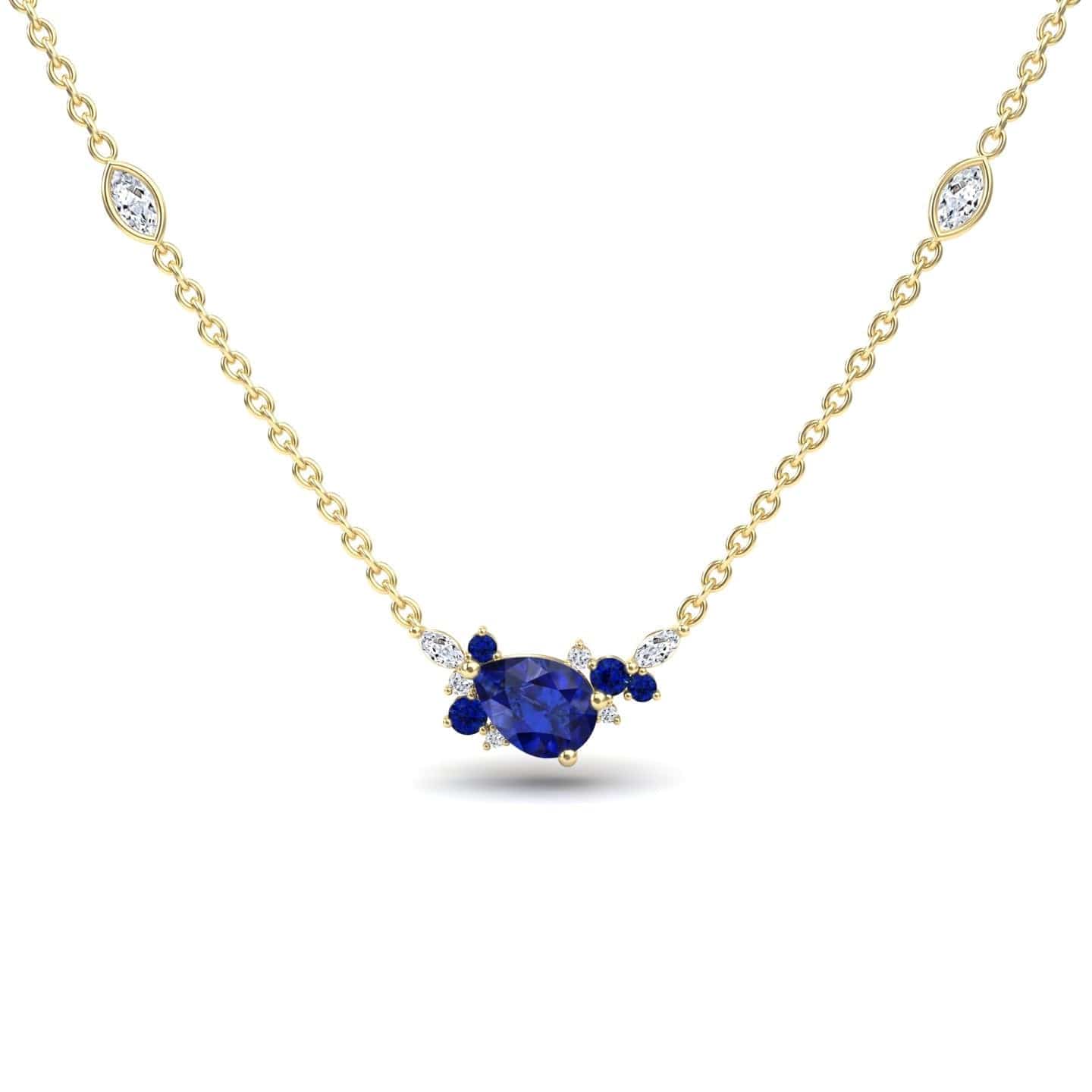 The Blue Sapphire & Diamond Bouquet Necklace - Daria features a gold chain with a central pear-shaped blue gemstone, accented by small blue and white stones and two marquise-cut white stones along the chain.