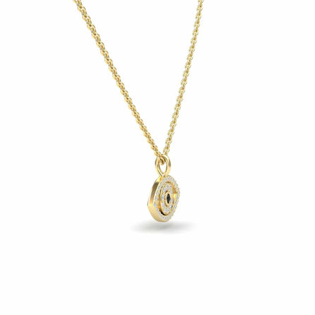 The Black & White Diamond Eye Necklace - Elise is a gold chain necklace with a circular pendant, featuring a central dark stone encircled by small clear stones, shown on a white background.