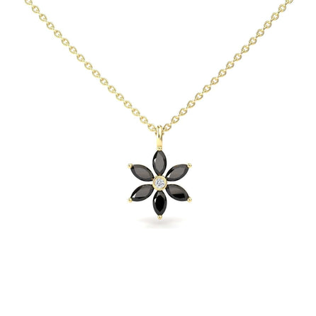 The Black Diamond & Diamond Floral Necklace - Erin features a gold chain with a flower-shaped pendant, six black stones as petals, and a central clear stone.