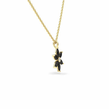 The Black Diamond & Diamond Floral Necklace - Erin features a gold chain and a six-petal black flower-shaped pendant with a central gemstone, shown against a plain white background.