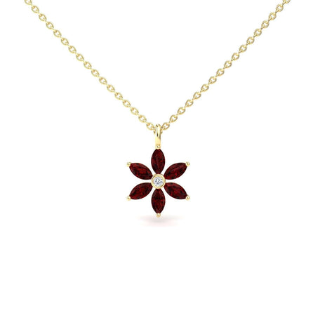 The Lab Grown Ruby & Diamond Floral Necklace - Erin features a gold chain with a flower-shaped pendant adorned with six marquise-cut red rubies as petals and a round diamond at the center.