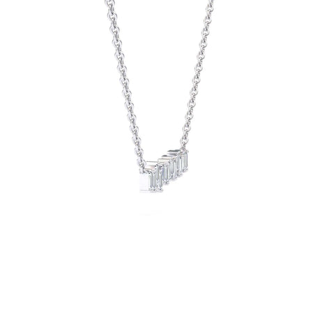The White Diamond Geometric Bar Necklace - Fernanda features a delicate silver chain with a row of vertically set rectangular gemstones, showcased on a plain white background.