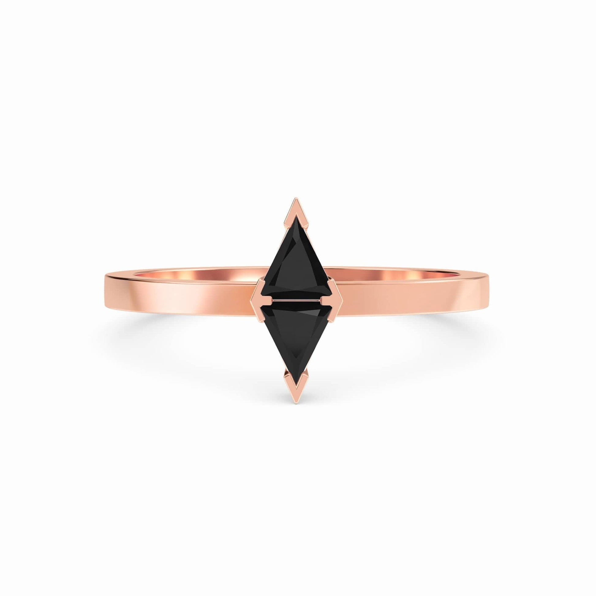 The Black Diamond Triangle Statement Ring - Shalini showcases a geometric black diamond set vertically on a minimalist rose gold band against a white background.