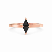 The Black Diamond Triangle Statement Ring - Shalini showcases a geometric black diamond set vertically on a minimalist rose gold band against a white background.