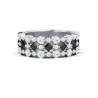 The Black & White Diamond Lace Band Ring - Victoria features alternating round white and square black diamonds set in a delicate, lattice-inspired silver band.