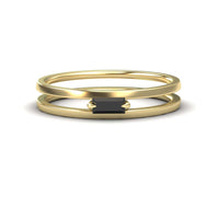 The Black Diamond Minimalist Double Band Ring - Alia showcases a rectangular black gemstone set horizontally on a slim, double gold band, displayed against a white background.