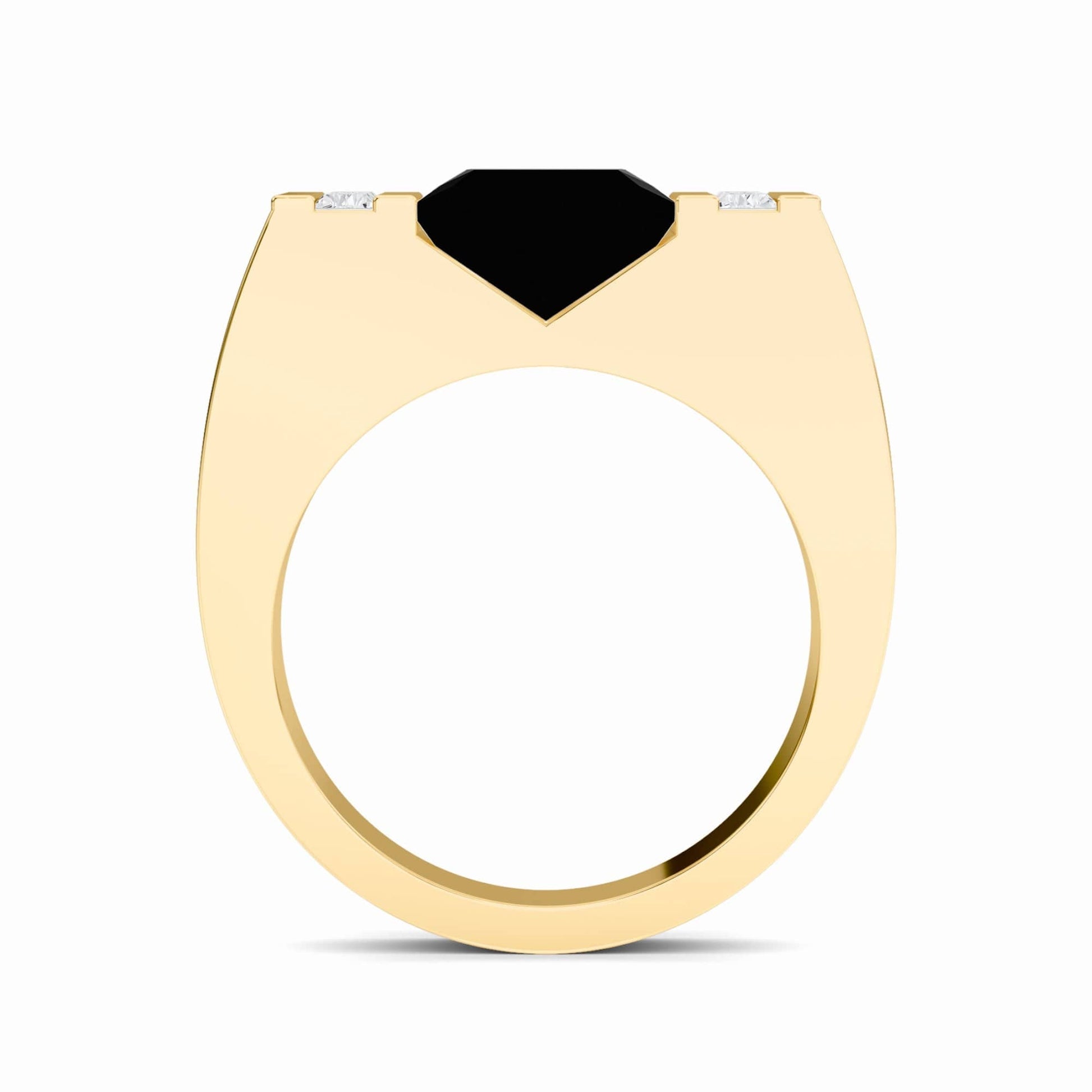 The Casper Black & White Diamond Mens Statement Ring features a flat gold band with a central black gemstone flanked by two small white diamonds, displayed on a white background.