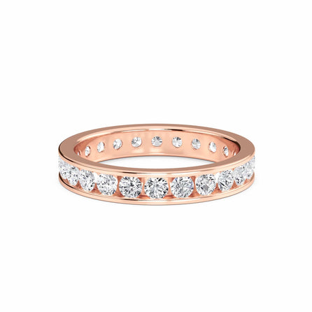 Rose gold ring with diamonds on a white background