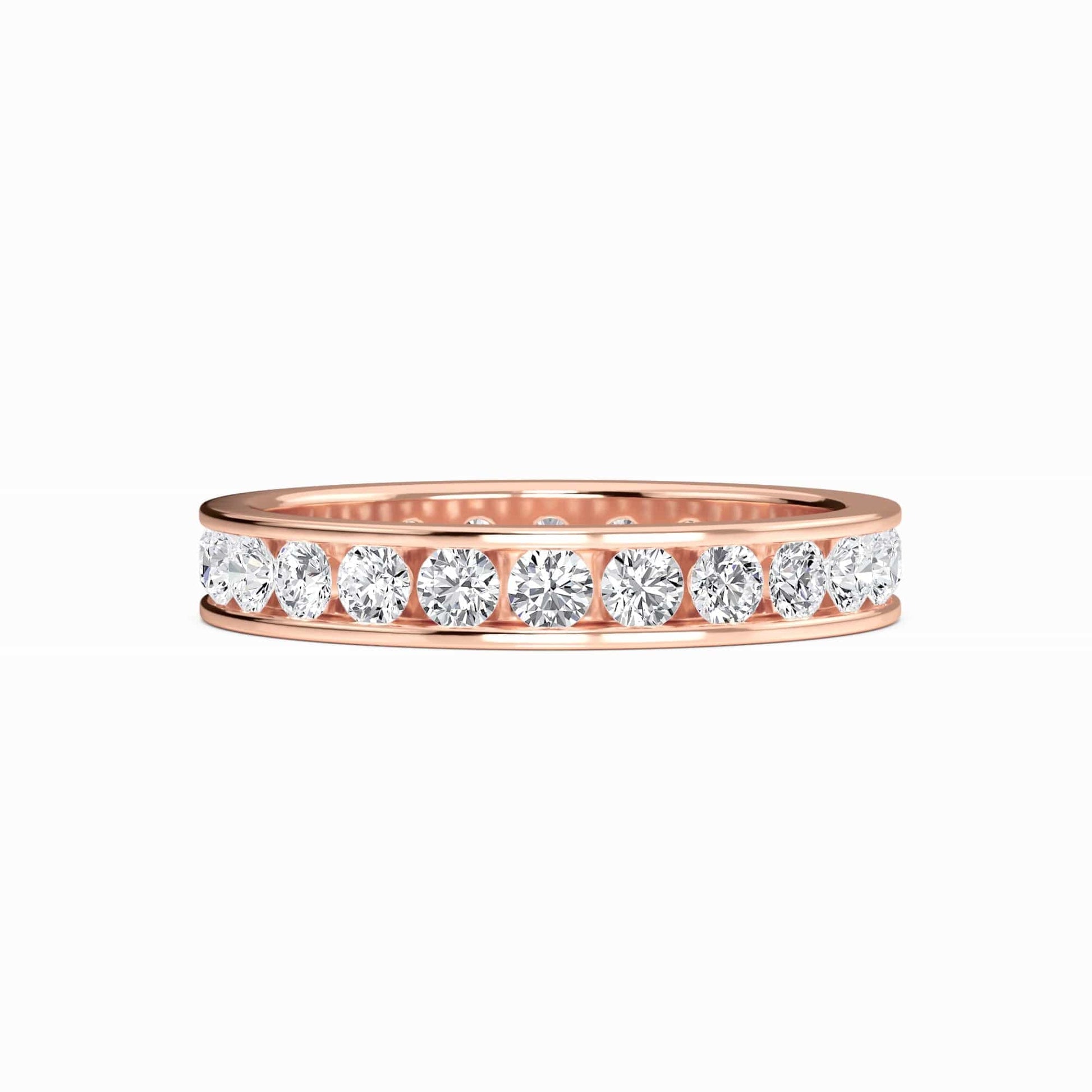 Rose gold ring with diamonds on a white background