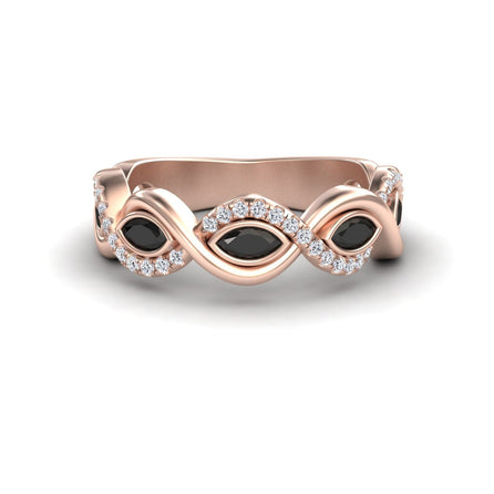 The Selma Black & White Diamond Infinity Twist Band features a rose gold infinity loop with three marquise black stones and white diamond accents, beautifully displayed on a white background.