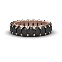 The Black Diamond Full Eternity Band - Diana showcases a continuous row of oval black gems in rose gold prong settings, displayed on a white background.