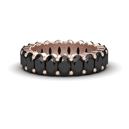 The Black Diamond Full Eternity Band - Diana showcases a continuous row of oval black gems in rose gold prong settings, displayed on a white background.