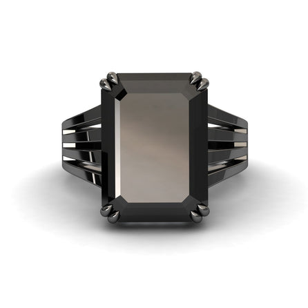 The Black & White Diamond Fashion Solitaire Ring - Tasmia features a rectangular black gemstone in a black metal setting with a split shank, shown from the front on a white background.