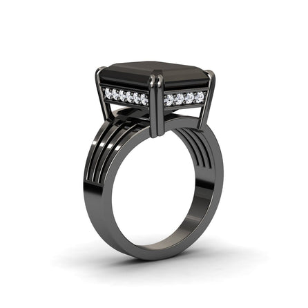 The Black & White Diamond Fashion Solitaire Ring - Tasmia features a sleek black band with a large geometric black stone in a prong setting, accented by white diamonds beneath and a modern layered design.