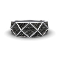 The Black Diamond Geometric Pave Set Statement Band - Blanca features a wide silver band with triangular sections accented by pave-set black stones for a bold, modern look.