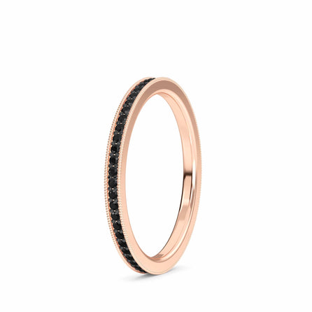 The Black Diamond Milgrain Eternity Pave Band - Mariel is a thin rose gold ring with a continuous row of small black diamonds and delicate milgrain detailing along the edges.