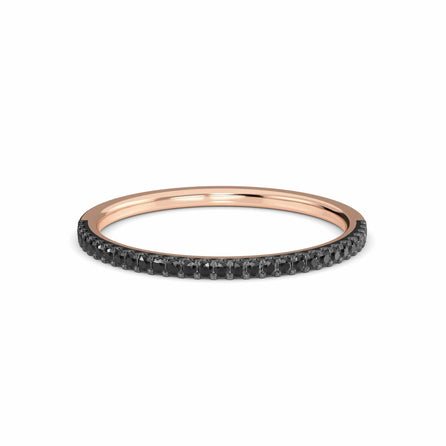 The Stephanie Black Diamond Pave Half Eternity Band Ring features a thin rose gold band with a row of small black diamonds, shown against a white background.