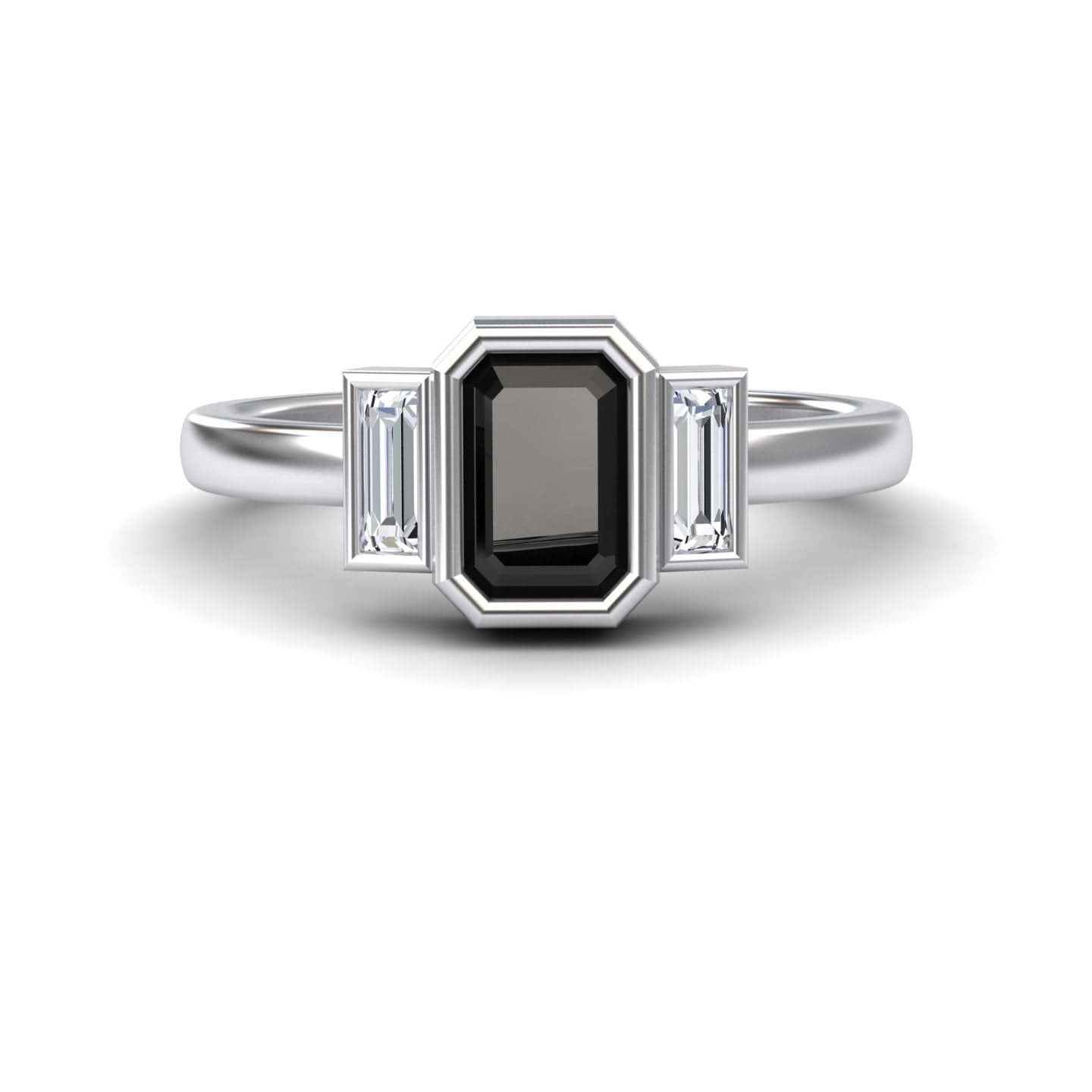 The Black & White Diamond Three-Stone Art Deco Ring - Ivy features a rectangular black gemstone center, flanked by two smaller baguette-cut clear stones on each side, shown against a white background.