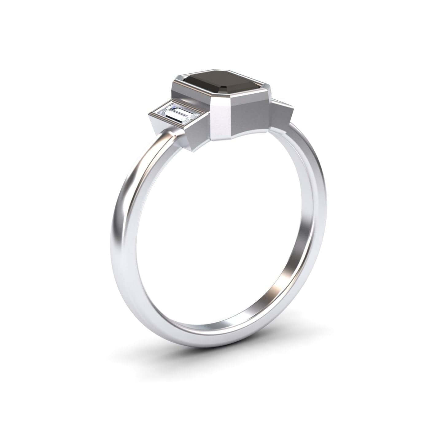 The Black & White Diamond Three-Stone Art Deco Ring - Ivy features a rectangular black gemstone center with two smaller clear stones on a polished silver band, displayed against a white background.