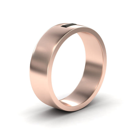 The Black Diamond Solitaire Men’s Band Ring - Nayana features a rose gold band with a smooth, matte finish and a small rectangular black diamond detail on top, displayed against a white background.