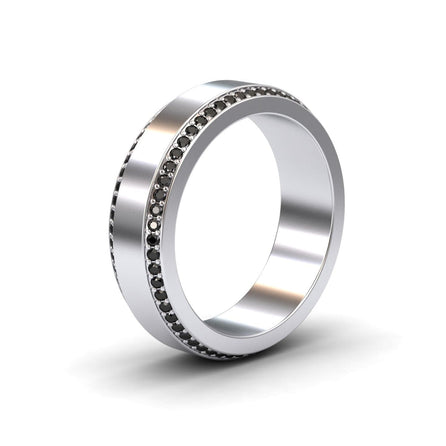 The Black Diamond 6mm Eternity Wedding Ring - Caleb is a silver ring with a single row of small black stones encircling its edge, displayed on a white background.