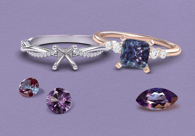 Two rings with gemstones on a purple background