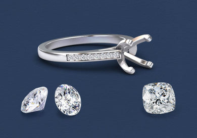 Silver ring with moissanite setting on a dark blue background