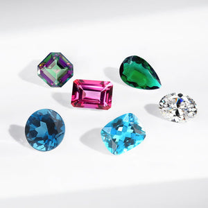 Colors of Topaz and Its Origins