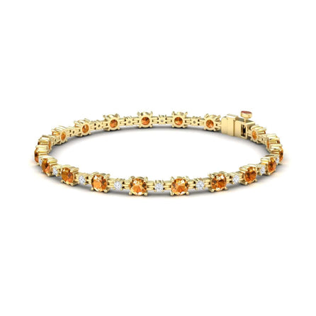 The Citrine & Diamond Tennis Bracelet - Natalia features alternating round citrine gemstones and small diamonds, shown against a white background.