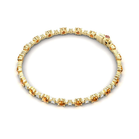 The Citrine & Diamond Tennis Bracelet - Natalia features alternating round yellow citrine gemstones and small diamonds in a delicate, repeating pattern, displayed against a white background.