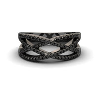 The Black Diamond Criss-Cross Pave Band Ring - Eden features multiple thin black bands set with sparkling black stones in a bold, modern design. Shown on a white background, itβs an elegant statement piece.