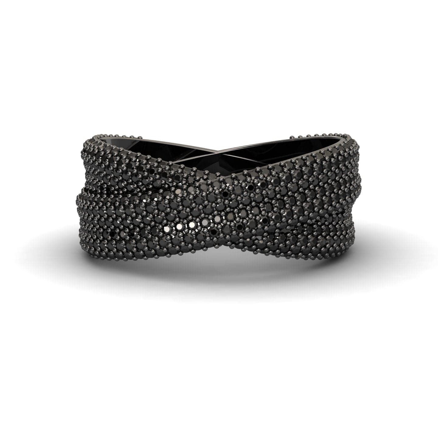 The Black Diamond Pave Crossover Statement Ring - Noor features a crisscrossed black design with textured, raised bead details for a modern, intricate look.