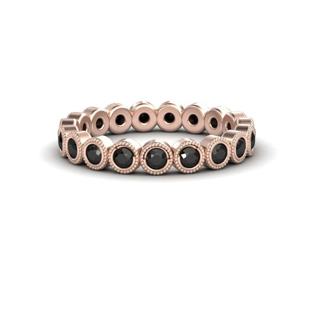 The Black Diamond Milgrain Bezel Set Eternity Band - Ira features a rose gold band with round black gemstones in bezel settings and milgrain detailing, shown on a white background.