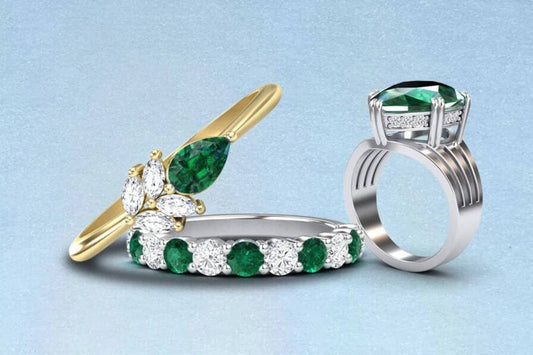 Emerald engagement rings with white and yellow gold