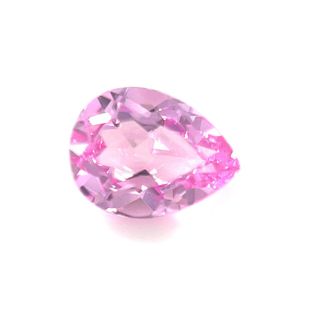 The 8.0x6.0 Exceptional Pear Lab Created Medium Pink Sapphire is shown against a white background, highlighting its vibrant medium pink color and brilliant cut.