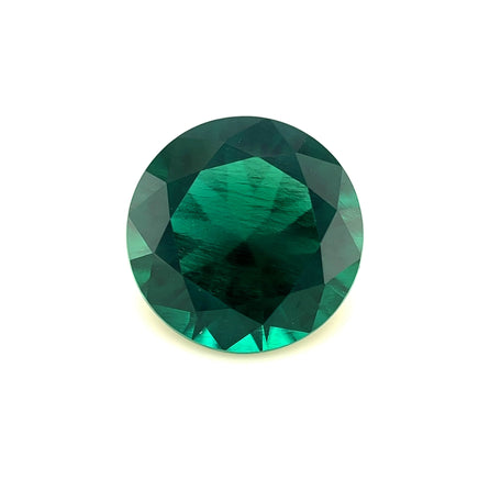The 11mm Exceptional Round Zambian Color Lab Created Emerald features a deep, rich green color and vivid internal reflections, showcased against a plain white background.
