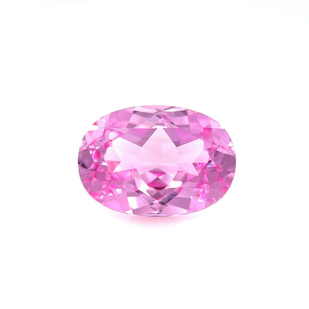 The 14.0x10.0 Exceptional Emerald Lab Created Medium Pink Sapphire is showcased against a plain white background, emphasizing its vibrant medium pink color and sparkling reflective surfaces.