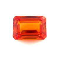 The 14.0x10.0 Exceptional Emerald Lab Created Orange Sapphire features a rectangular, faceted shape with beveled edges and is shown against a plain white background.